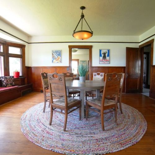 Gather around the dining room table for a meal, or cozy up on the window seat.