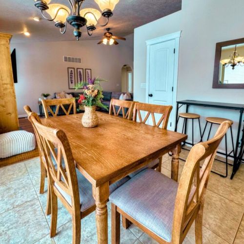 Gather around the dining table for conversation, food, and fun.