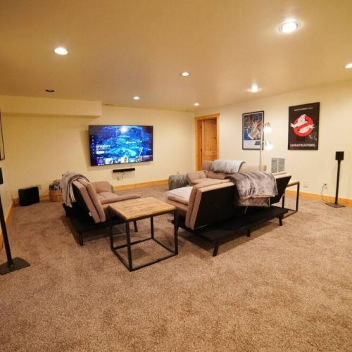 Enjoy a movie night in the home theater, complete with an 82" smart TV and a Sonos surround system!
