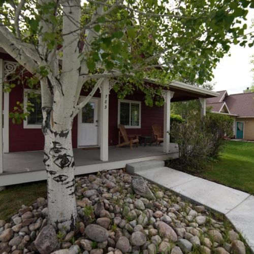 Front porch to hang out and enjoy the mountain air on your summer vacation.
