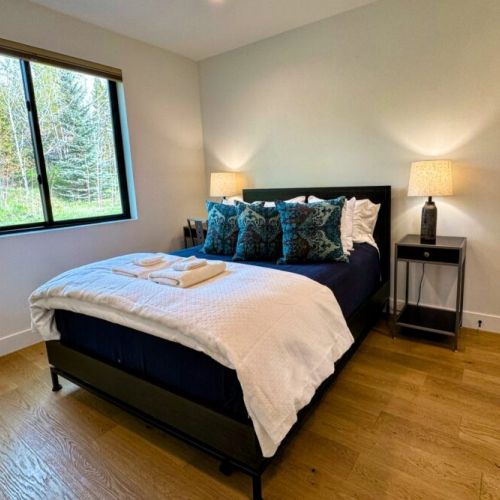 Bedroom #3 (ground floor) has a queen bed and an en suite bathroom.