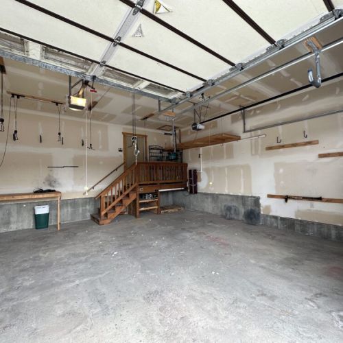 This large 2-car garage comes with plenty of space for your vehicles and gear.