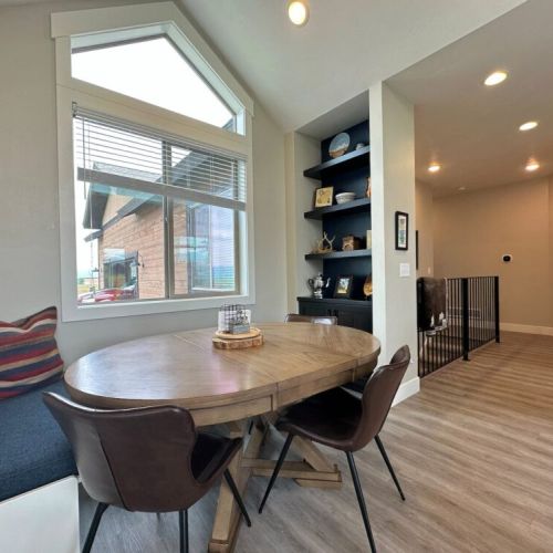 Gather around the dining table for a meal, conversation, or some fun.