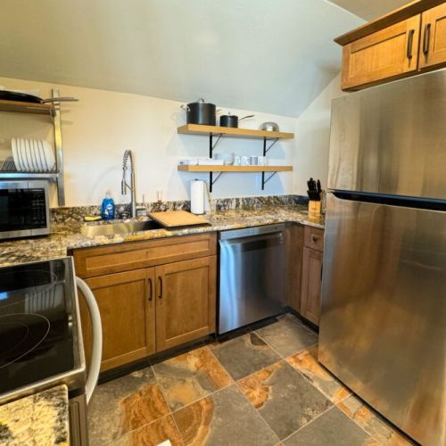 The fully stocked kitchen comes with everything needed to prepare meals for the whole family.