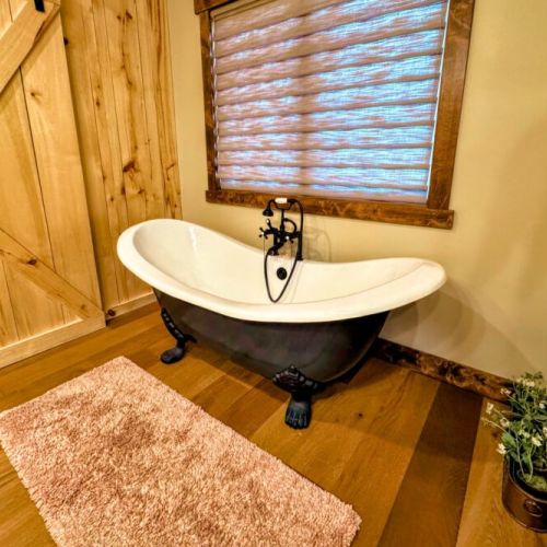There is a beautiful clawfoot tub in the master bath.