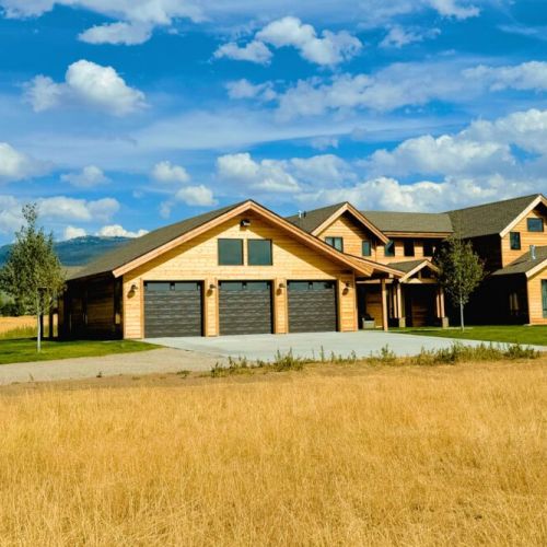 With a chic mountain-modern design to complement useful amenities, such as a spacious three-car garage, this home has plenty to offer any group.