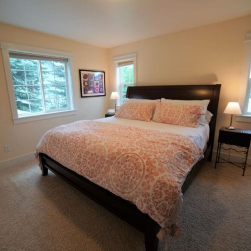 Master suite with king bed and attached bathroom.