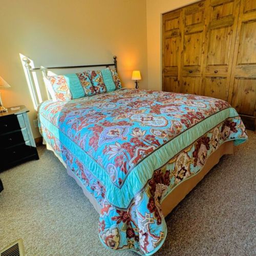Bedroom #3, which looks out into the backyard, has a queen bed and plenty of closet space.