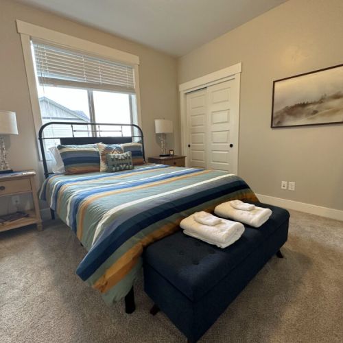 Bedroom #2, located on the main floor, has a queen bed and a large closet.