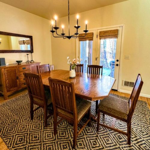 Gather around the dining table for food, conversation, and fun.