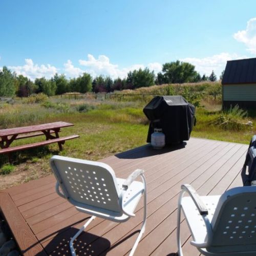 Head to the backyard for some outdoor fun, including a propane grill.