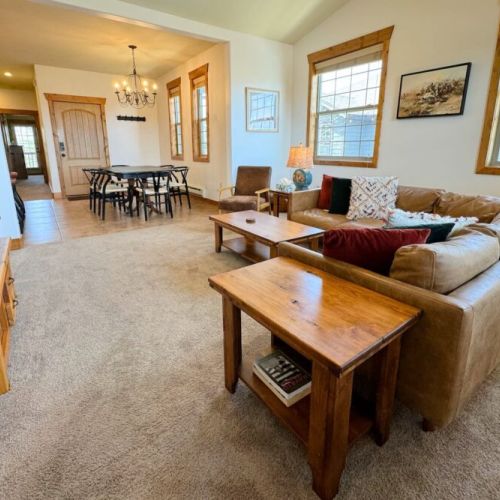 Whether you are cooking in the kitchen, eating at the dining table, or lounging in the living room, the open layout means you can always be a part of the fun in this condo.