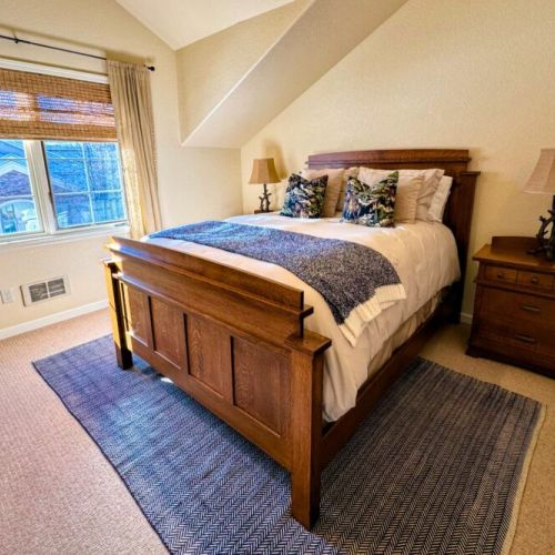 Bedroom #2 has a queen bed and plenty of storage space.