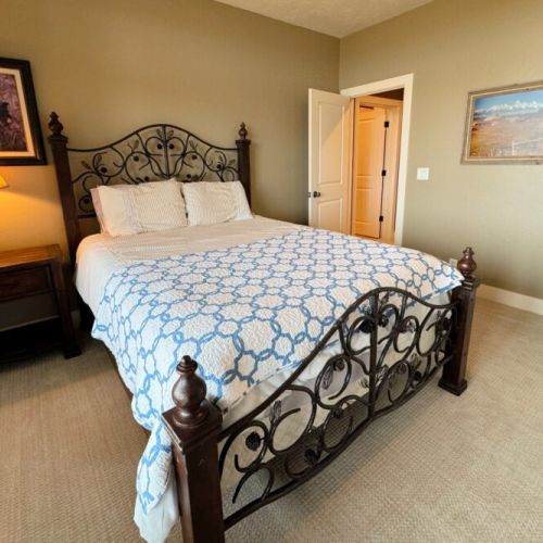 Bedroom #4 has a queen bed and a twin-over-twin bunk.