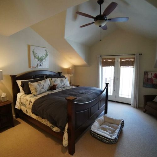 Second floor master suite has a king bed to treat Mom and Dad right.
