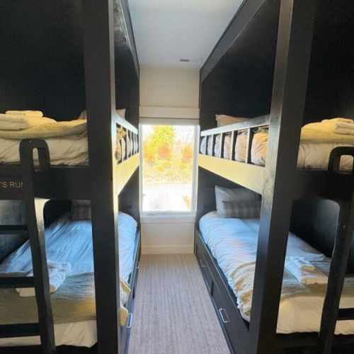 Bedroom #4 has two built-in twin-over-twin bunk beds — perfect for kids!