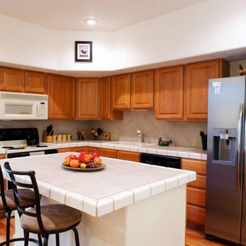 Kitchen complete with island.
