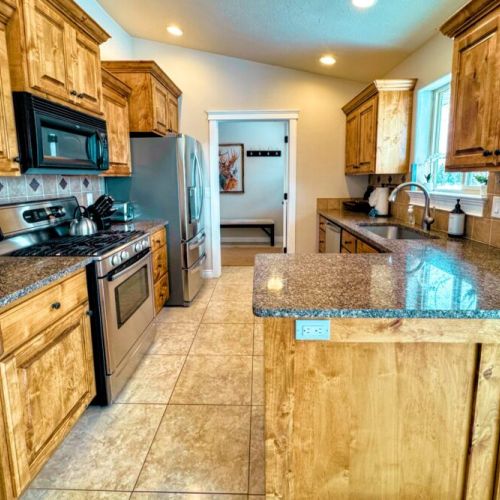 The fully equipped kitchen comes with everything you'd need to whip up a meal for the whole group.