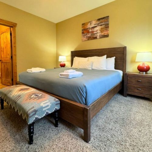 The master bedroom has a king bed, a terrific window seat, and an en suite bath.