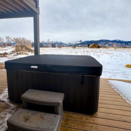 Soak your cares away in the private hot tub — it is the perfect way to relax during your time here.