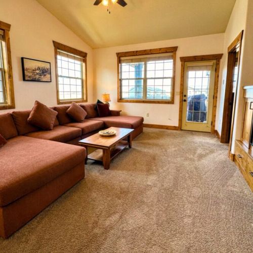 Whether you are cooking in the kitchen, eating at the dining table, or lounging in the living room, the open layout means you can always be a part of the fun in this condo.