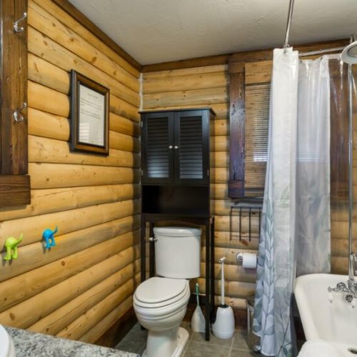 The shared full bathroom is located on the main floor of the home, enjoying a tub/shower and a vanity.