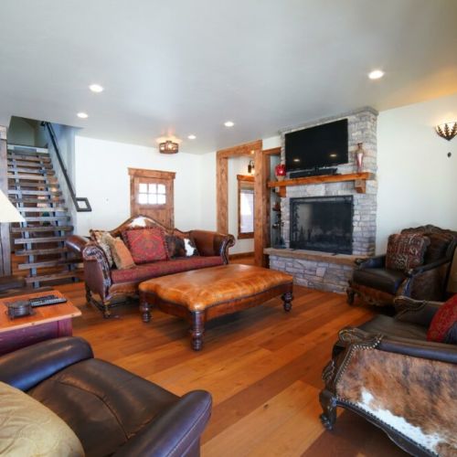 Kick back and relax in the living room, taking advantage of the cozy seating and a large TV.