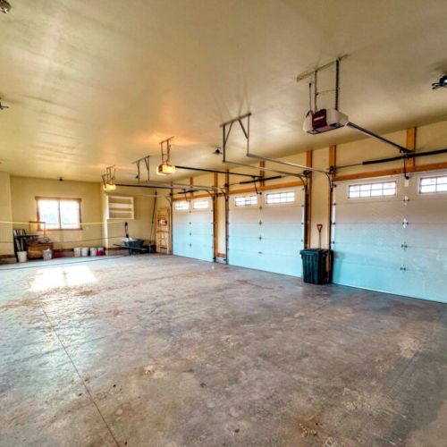 Store your vehicles, gear, or other items in this enormous three-car garage!