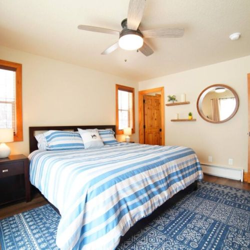 The master bedroom has a king bed and an en suite bath, as well as a large closet.