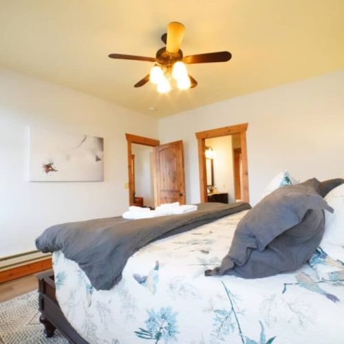The master bedroom enjoys a king bed and an ensuite bath.