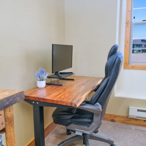 The sit-stand desk is perfect for work-from-home travelers!