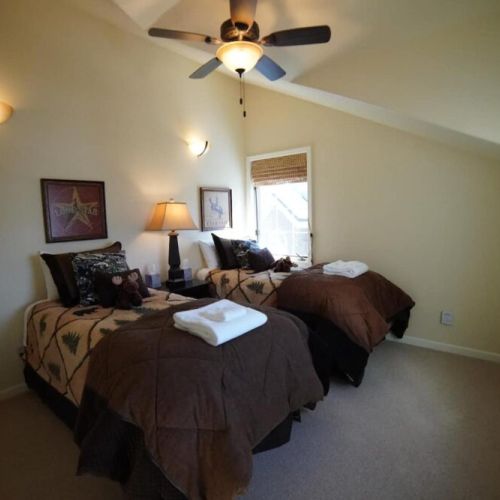 A western-themed room with our two twin beds — perfect for the kids.