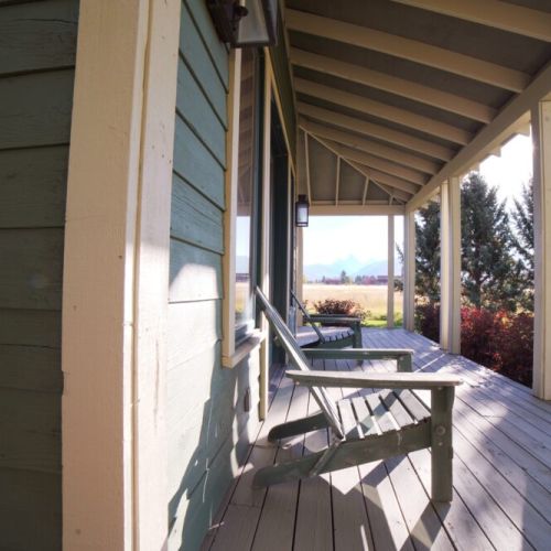 Relax on the porch, enjoying unmatched views of the Tetons.