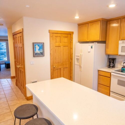 The kitchen flows nicely into the dining area, keeping everyone engaged and together when preparing or enjoying a meal.