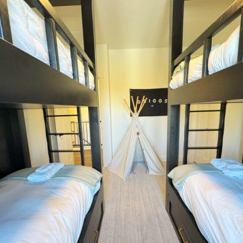 Bedroom #4 has two built-in twin-over-twin bunk beds — perfect for kids!