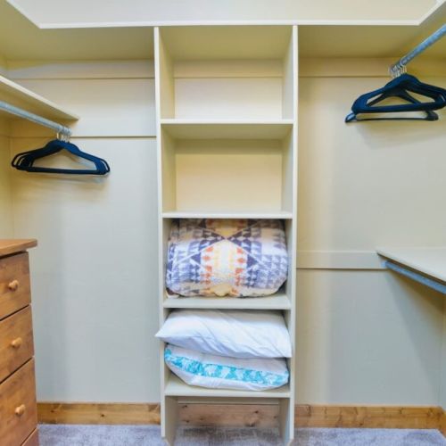 The en suite bath comes with a double vanity, large tub/shower combo, and a spacious closet.