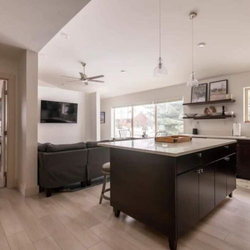 The home's open layout ensures that no one is ever left out of the fun.