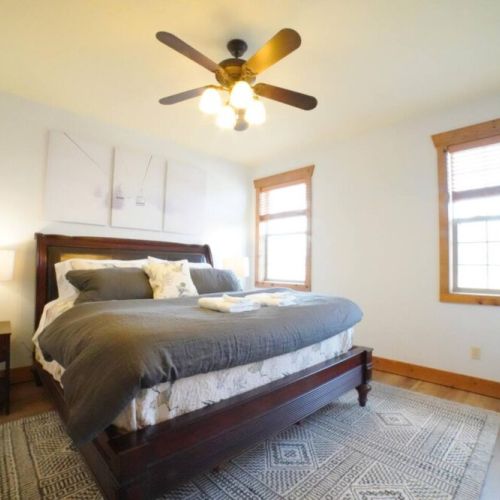 The master bedroom enjoys a king bed and an ensuite bath.
