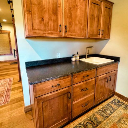 Make use of the wet bar off of the living room to prepare drinks and other goodies.