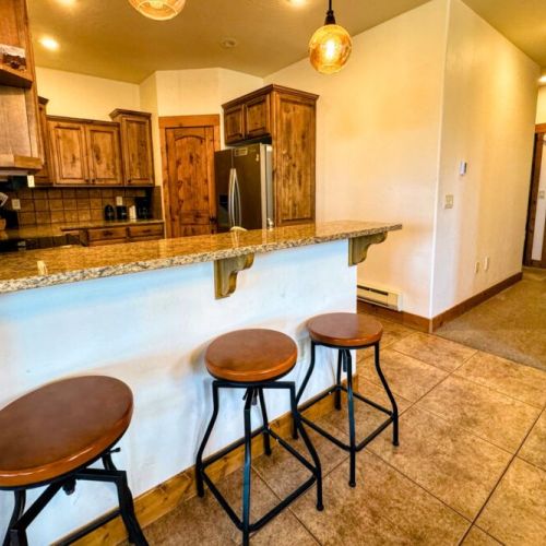 Cozy up to the bar using the stools for a morning cup of coffee or an evening nightcap.