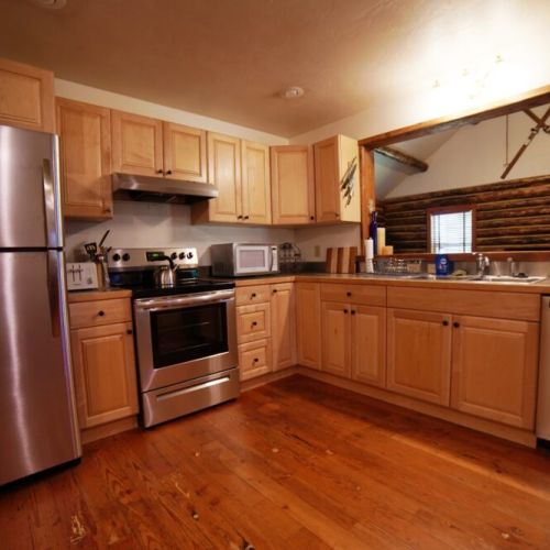 The kitchen has refreshed appliances and all the cooking tools you'd need to make a meal for friends and family.