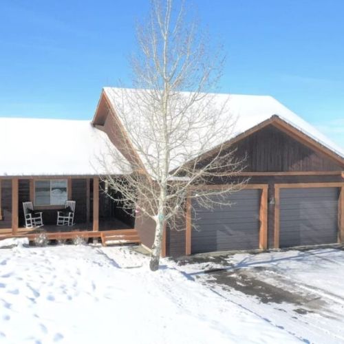 A view of the house from the street — this is the perfect vacation retreat!
