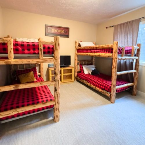 Bedroom #3 has two twin-over-twin bunk beds — perfect for kids!